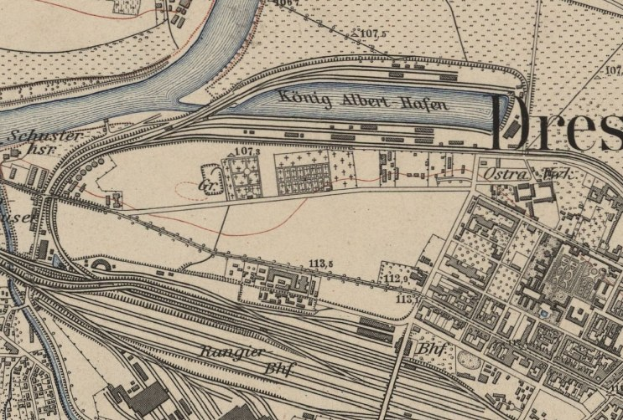 Ein detaillierter historischer Stadtplan von Dresden, Deutschland, der einen Fluss, Gebäude, Straßen und Textanmerkungen zeigt.