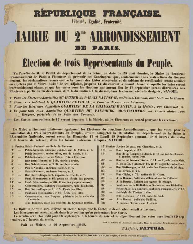 Eine schwarz-weiße Zeitung mit dem Bild eines Mannes und einer Wahlurne.