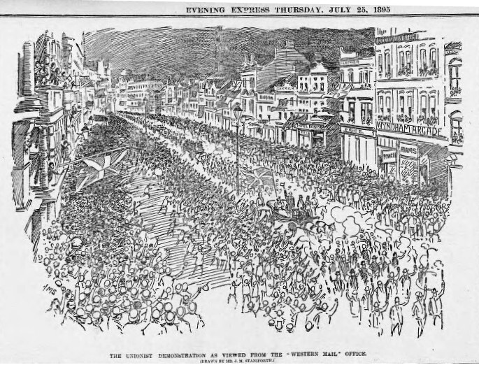 Schwarze und weiße Zeichnung einer Menge, die eine Straße zwischen Gebäuden entlanggeht, mit Text oben und unten, der "Die Unionistendemonstration aus der Sicht der Western Mail Office" lautet.