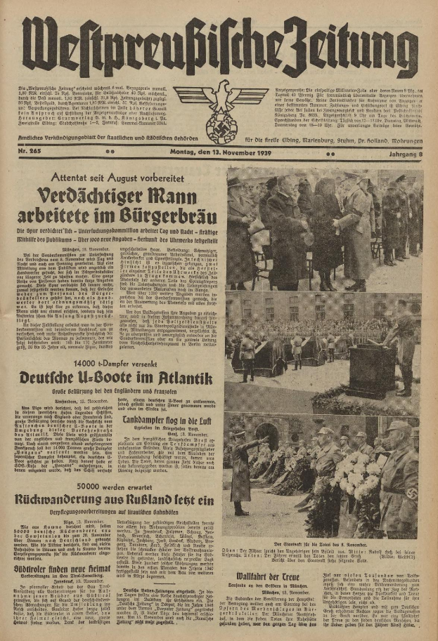 Schwarze und weiße Titelseite einer deutschen Zeitung vom 13. November 1939, betitelt 'Weitpreubliche Zeitung', mit einer Gruppe von Menschen in traditioneller deutscher Kleidung in einer feierlichen Szenerie.